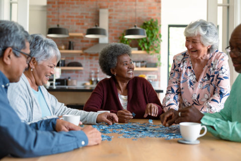 group of elderly playing